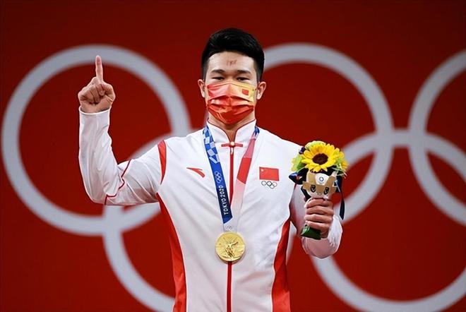 举重冠军石智勇属什么生肖_举重冠军石智勇的故事_男子举重石智勇是否获得冠军